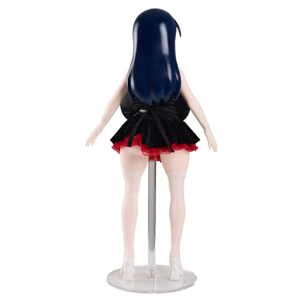 Image of Back view of Audrey showing her long dark blue hair and the rear of her black-and-crimson outfit.