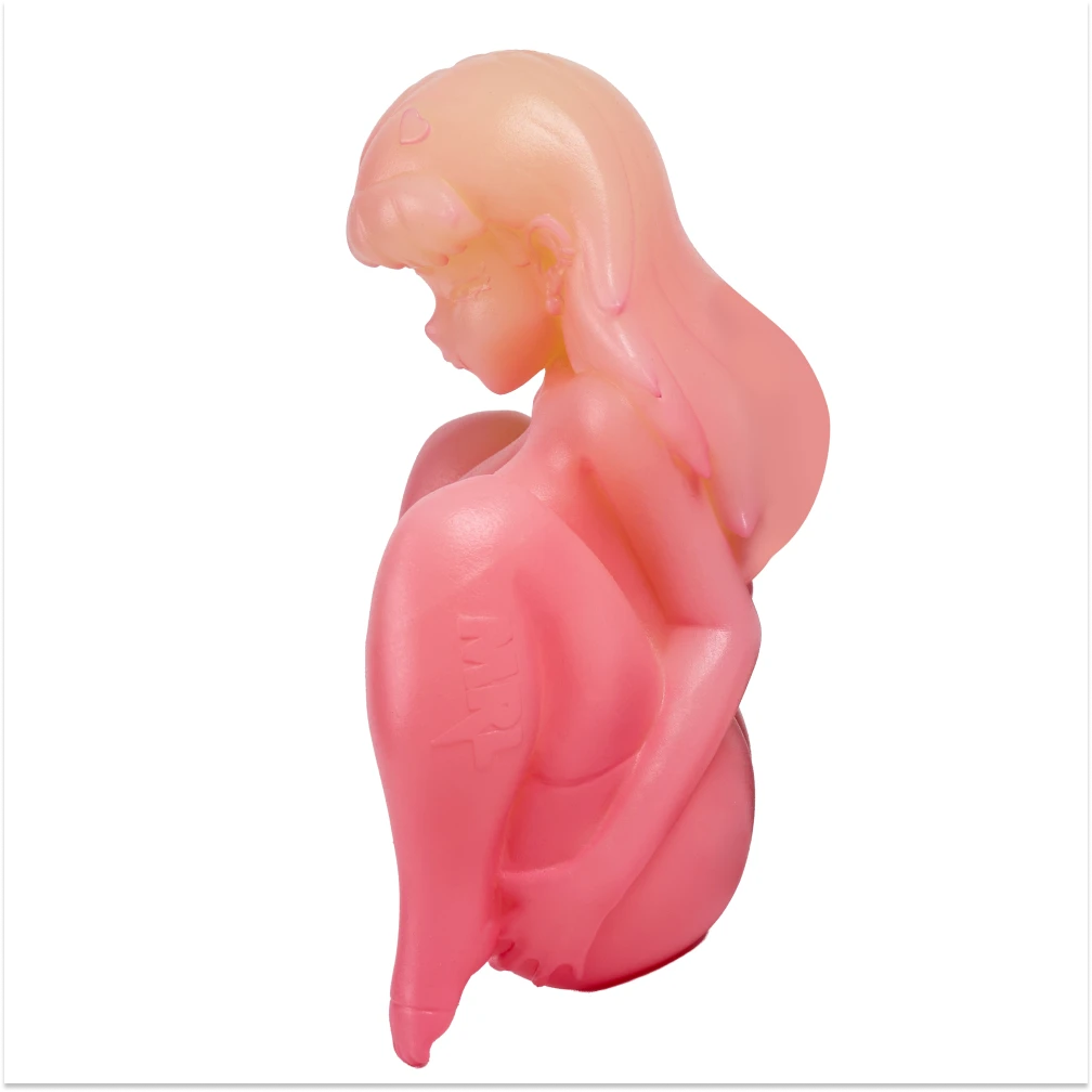 Image of Side profile of the pink cindy anime onahole on a white background.