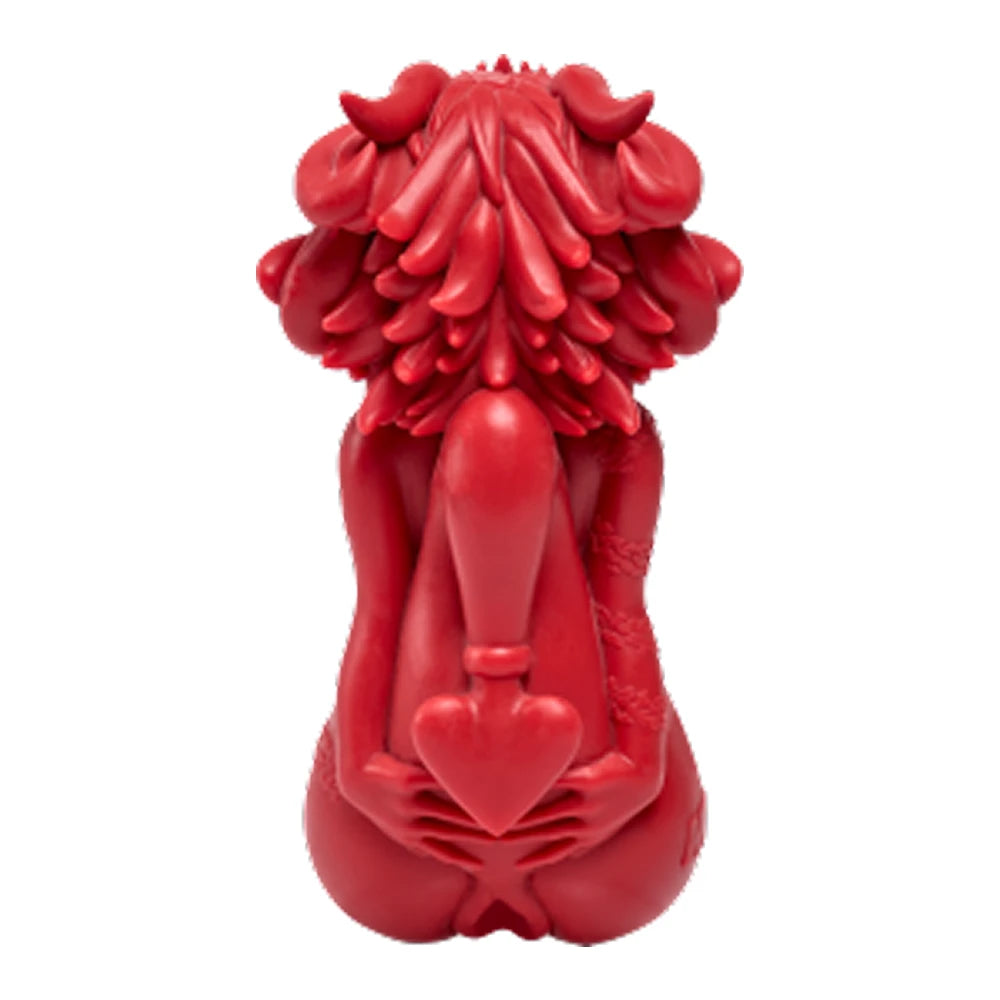 Image of Rear view of Dreddy femboy imp doll with hands behind the back, wide hips, horns and heart-tipped tails.