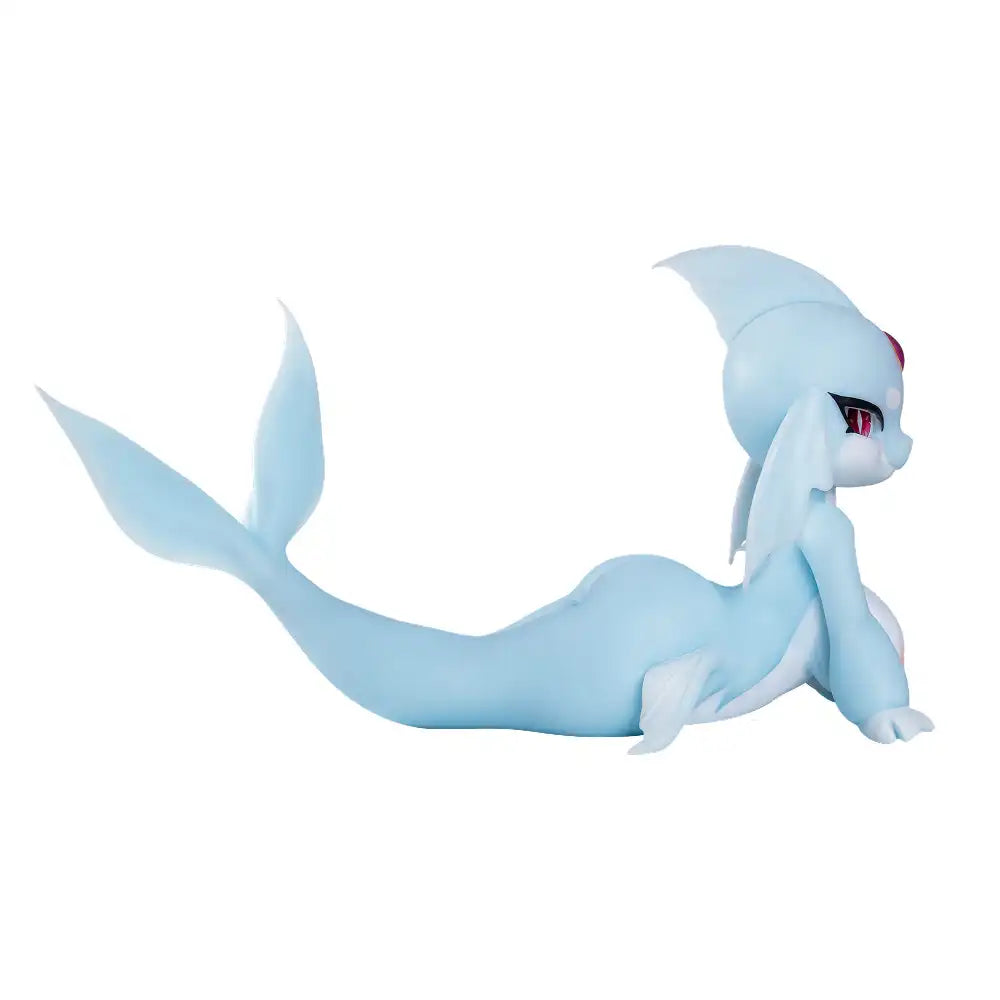 Image of Side view of Ripna mermaid sex doll showing her sculpted blue body, fin-shaped ears and full fish tail on a white background.
